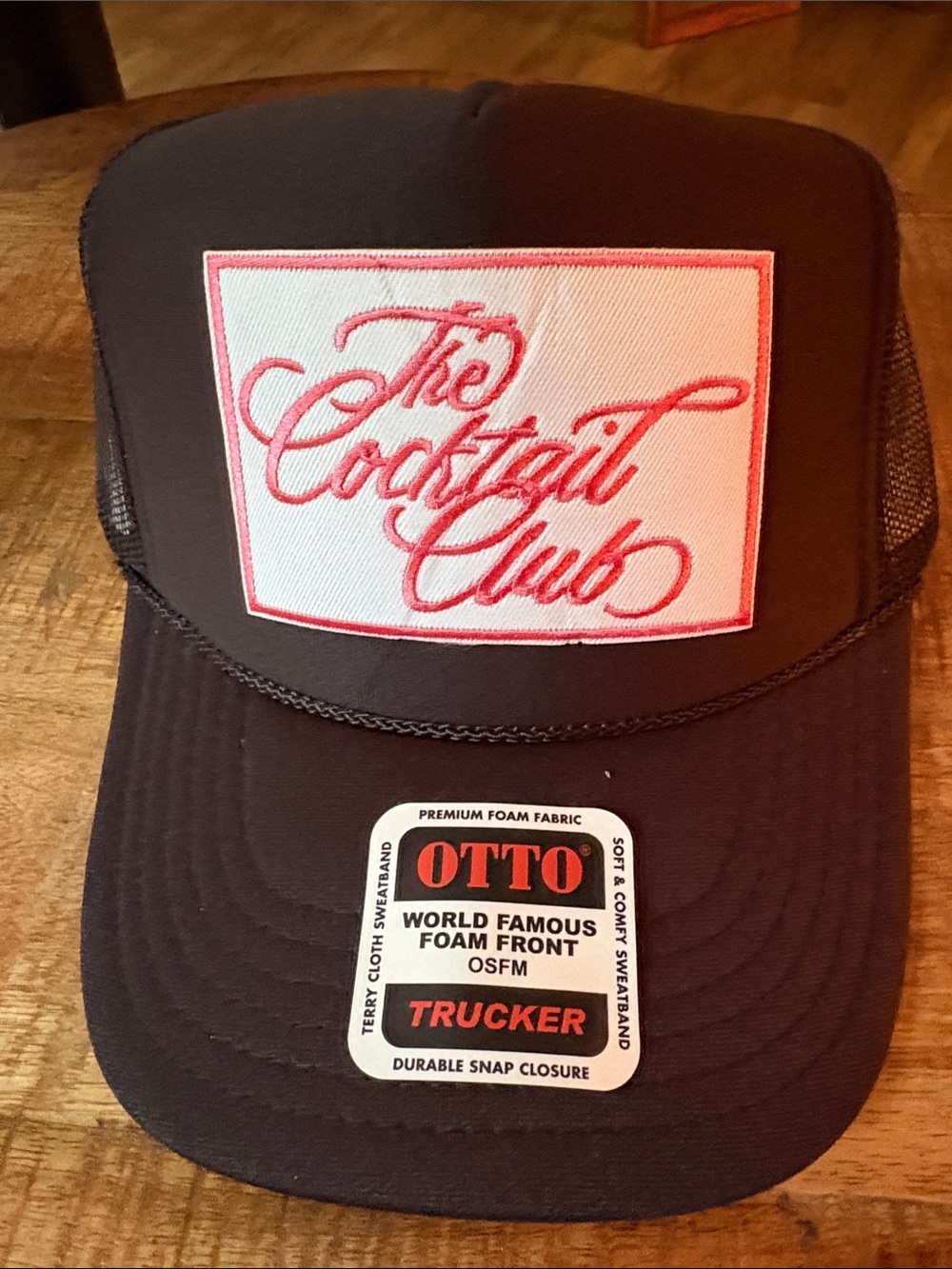 OTTO Black Trucker Hat with Pink Script Patch